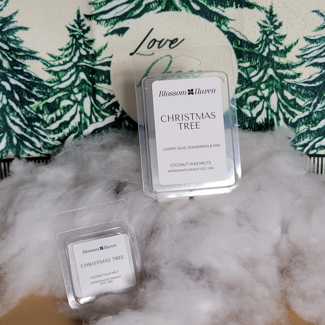 Two small rectangular products labeled 'Christmas Tree' on a textured surface with green leaf pattern.